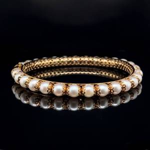 lot 58 image: Elegant Vintage Round White Pearl Bangle Bracelet in 18k Yellow Gold - 21.80 Grams $2100 Retail