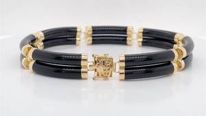lot 79 image: Asian Character Tubular Convex Cabochon Onyx Double Link Bracelet in 14k Yellow Gold - 20 GRAMS