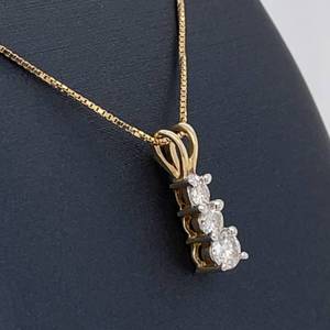 lot 95 image: Classic Elegance 0.25ctw 3-Stone Diamond Past, Present & Future Journey Pendant in Yellow Gold