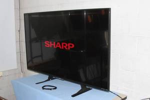lot 1 image: Sharp Aquos 65 4K Ultra HD LED Smart TV  Television  Display - Model LC-65UB30U w Table Stand & Remote Control