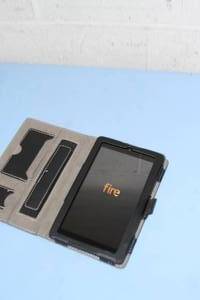 lot 32 image: Amazon Kindle Fire 7 - Model SRO43KL - 7 Display Computer Tablet 16GB with Case