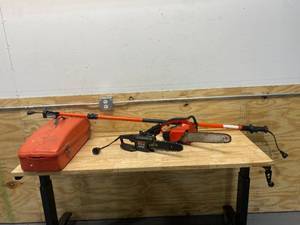 lot 69 image: HOMELITE XL2 Automatic Chainsaw with REMINGTON LNT-2, Pole Saw8 Chainsaw (Model# 108526-01) and Case