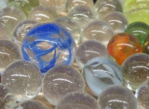 LOT OF CLEAR PURIE MARBLES PLUS