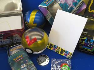 POKEMON TINS AND CARDS