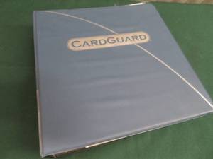 ALBUM FULL OF BASKETBALL AND FOOTBALL CARDS