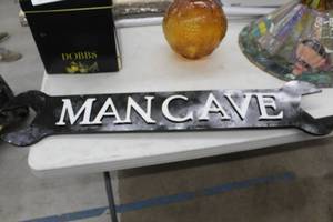 lot 972 image: Man Cave Metal Open End Wrench Wall Sign