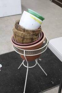 lot 991 image: Plant Table with Plastic Plant Pots