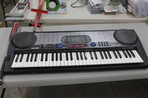 lot 994 image: Casio 100 Song Bank CTX 55I Keyboard