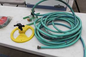 lot 1051 image: Garden Hose, (2) Sprinklers