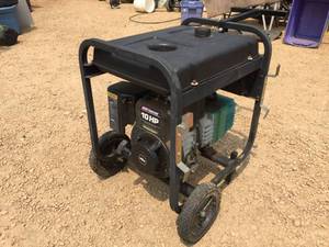 lot 7 image: Coleman Powermate Powerbase 5000 Portable Generator