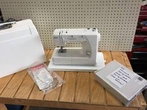 lot 102 image: Sears Kenmore Sewing Machine