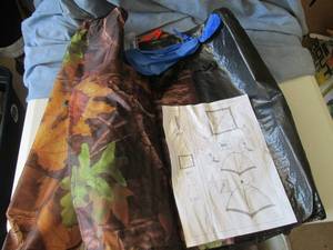 Camouflage pup tent (new unused)...