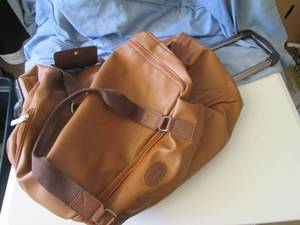 Bella russo faux leather travel bag...