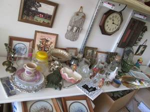Shelf of contents includes glasswar...
