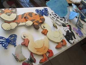 Several outdoor wooden animal decor...