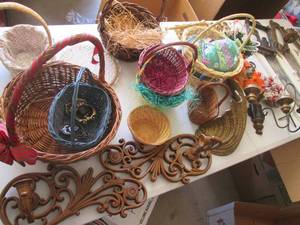 Several wicker baskets, wall sconce...