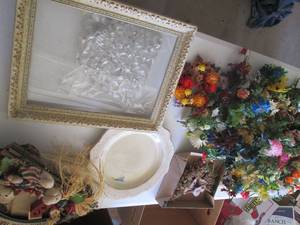 plastic flowers, picture frame with...