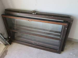 2 wood framed windows, top and bott...