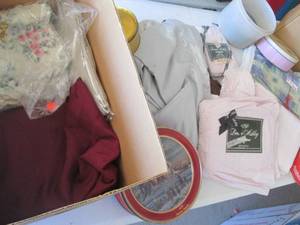Box of table cloths and bedding, an...