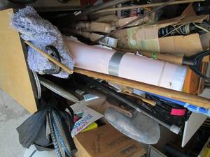 Box on rollers full of misc items i...