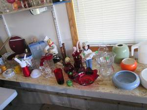 contents of shelf, including red gl...