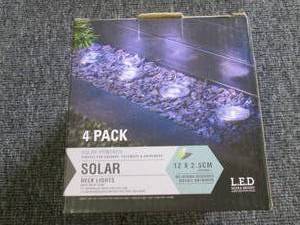 lot 20 image: 4 pack of solar deck lights ...