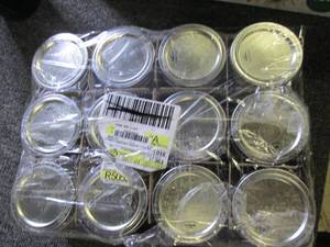 lot 76 image: case of 12 kerr 8 oz half pint jars...