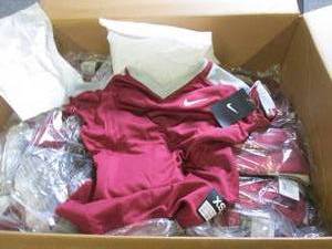 lot 149 image: case of girls XS nike softball shir...