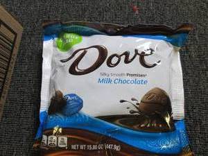 lot 183 image: 615.80oz bags of dove milk chocola...