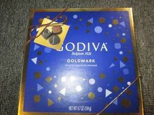 lot 203 image: 64.7oz packages of godiva assorted...