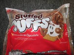 lot 219 image: 6 packages of stuffed puffs chocola...