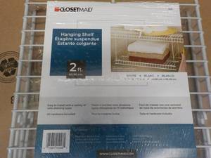 lot 425 image: Case of 4 - 2 ft Closet Maid Hangin...