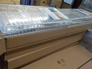 lot 426 image: Case of 4 - 2 ft Closet Maid Hangin...