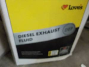 lot 445 image: 2.5 Liter Jug Loves Diesel Exhaust...