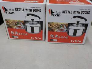 lot 486 image: 2 YIXIN Stainless Steel Kettles wit...