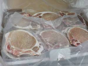 lot 522 image: 10 lb. Box Frozen Pork Chops...