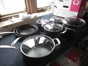 lot 141 image: Pots and Pans with some lids...
