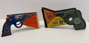 lot 5 image: Two Vintage Gun Advertisement Pieces