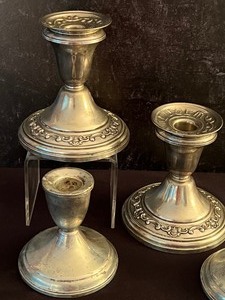 lot 34 image: Two Pairs of Vintage Sterling Silver Candle Holders