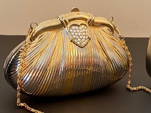 lot 123 image: Two Metal Clutch Handbags