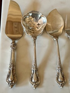 lot 143 image: Lunt Sterling Silver Eloquence Utensils Lunt Eloquence Sterling Deli Forks, Pierced Spoon and More
