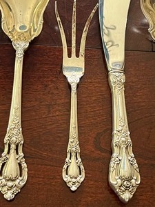 lot 144 image: Lunt Sterling Silver Eloquence Sugar Spoon, Lemon Fork and More