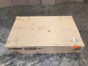 lot 19 image: Husky  52 in. Adjustable Height Work Table with 2-Drawers in Black not used