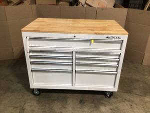 lot 38 image: Husky 46 in. W x 51 in. D Standard Duty 9-Drawer Mobile Workbench with Solid Top Full Length Extension Table in Gloss White see pictures