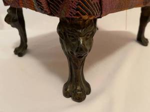lot 73 image: Padded Footstool with Metal Lion Head Legs
