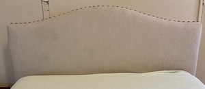 lot 146 image: Upholstered Queen Headboard and Frame with Rivet Detailing (mattress not included)