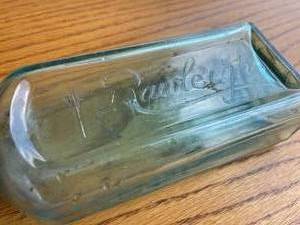 lot 309 image: Vintage Blue Glass Rawlieghs Bottle
