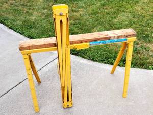 lot 120 image: (2) Yellow Metal Folding Sawhorses