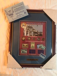lot 232 image: Framed Collection Coins and Stamps