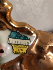 lot 84 image: Vintage Liquor Bottle